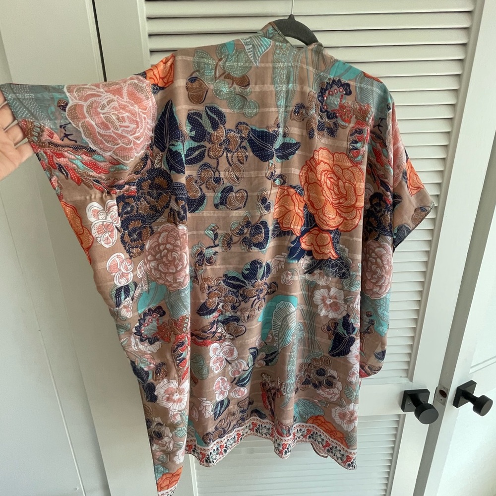 Reversible printed kimono. One size.  
More vibrant one side, more subtle other.